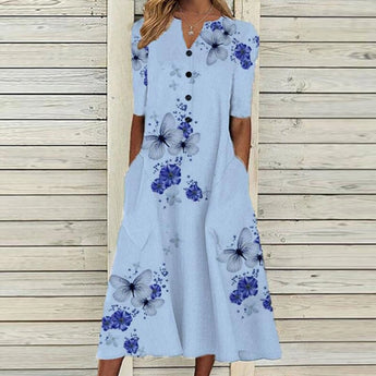 
A women's elegant midi dress featuring a purple butterfly and floral design, crafted from linen. The dress has a blue color variant in size 5XL, with a flattering waistline and a one-piece garment structure, ideal for daytime wear.