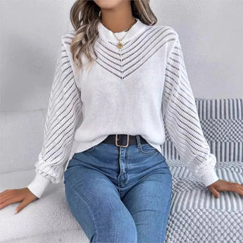 
A stylish women's elegant white V-neck knit sweater featuring distinctive lantern sleeves, displayed in an XL size.