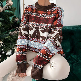 
A cozy blue and white Fair Isle knit Christmas sweater for women in size XL, featuring a classic pattern and long sleeves, perfect for holiday fashion.