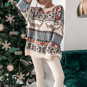Women's Fair Isle Christmas sweater in cozy blue and white knit, featuring a festive pattern. The sweater has long sleeves and a round neck, perfect for keeping warm during the holiday season.