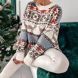 Cozy blue and white knit Women's Fair Isle Christmas Sweater in a beige color, featuring a classic pattern, long sleeves, and a comfortable fit in size XL.