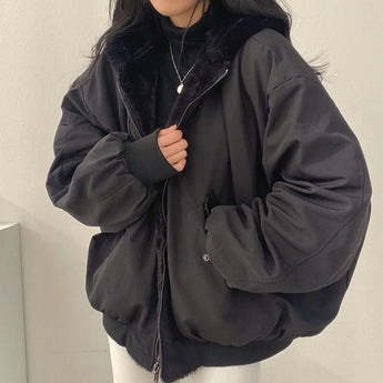 
A women's black faux fur vest in size XXL, featuring a cozy design perfect for winter layering fashion. The vest includes a stylish collar and is designed to provide warmth and comfort while maintaining a fashionable appearance.
