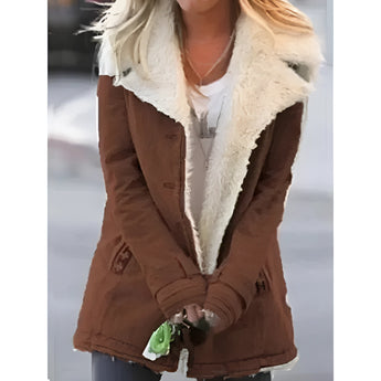 Women's brown corduroy jacket with fleece lining and a faux fur collar, featuring long sleeves and a waist-length design.