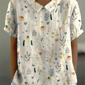 Women's white floral print short sleeve linen blouse with V-neck, size 3XL.