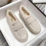 Women's cream-colored fluffy slippers featuring a plush fur design, non-slip sole, and warm interior for winter comfort, size 43.