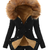 
A woman wearing a brown fur-trimmed hooded parka in size 2XL, featuring insulated material and faux fur detailing along the hood and collar, with long sleeves and a stylish, warm design suitable for winter.