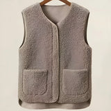 Light brown women's fuzzy shearling zip-up vest in size 6XL, featuring a cozy woolen texture and a stylish collar, perfect for winter fashion.