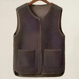 Women's dark brown fuzzy shearling zip-up vest in size 6XL, featuring a cozy and stylish winter fashion design with a silver zipper and collared neckline.