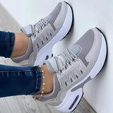 Women's gray lightweight breathable mesh sneakers with ankle support in size 43, designed for walking and outdoor activities, showcasing a sleek and sporty design.