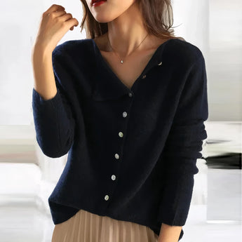 Women's dark blue V-neck wool cardigan in 2XL, featuring a soft, fitted design suitable for fall fashion, highlighting the shoulder, arm, and waist areas.