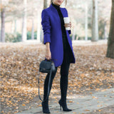 Women's gray wool coat in a slim fit design featuring a turtleneck collar, and long sleeves. The coat is styled for a chic and cozy look, suitable for cooler weather.