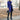 Women's gray wool coat in a slim fit design featuring a turtleneck collar, and long sleeves. The coat is styled for a chic and cozy look, suitable for cooler weather.