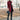 Women's gray wool coat in a slim fit design featuring a cozy turtleneck, showcased in a Bordeaux color, size 4XL. The coat is styled with knee-length sleeves and a tailored waist, emphasizing chic fashion elements.