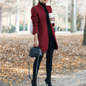Women's gray wool coat in a slim fit design featuring a cozy turtleneck, showcased in a Bordeaux color, size 4XL. The coat is styled with knee-length sleeves and a tailored waist, emphasizing chic fashion elements.