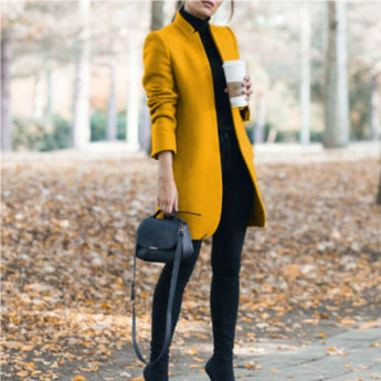A stylish women's gray wool coat with a slim fit and turtleneck design, featuring long sleeves and a cozy chic fashion.