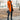 Women's orange wool coat with a slim fit turtleneck style, featuring long sleeves. The coat is in a 4XL size, designed for cozy and chic fashion.