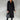 A women's gray wool knee-length coat with long sleeves and structured shoulders, designed for urban fashion, displayed in a size 3XL.