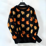 Women's black autumn leaf knit sweater in XL, featuring long sleeves, a stylish collar, and a patterned orange design suitable for fall fashion.