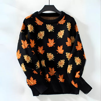Women's black autumn leaf knit sweater in XL, featuring long sleeves, a stylish collar, and a patterned orange design suitable for fall fashion.