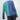 Women's green and blue two-tone color block knit sweater featuring long sleeves and a round neckline.