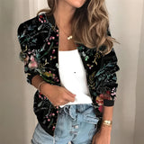 Women's green floral blazer with black and white printed design, featuring long sleeves and a tailored fit suitable for casual chic spring wear.