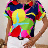 Women's green leaf print blouse with short sleeves, featuring a mix of white, purple, and pink colors, displayed in a 2XL size.
