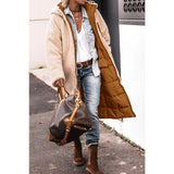 Women's green sherpa-lined insulated parka showcasing its outerwear design with long sleeves and a high neck collar. The coat appears suitable for urban winter fashion.