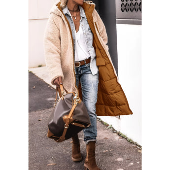 Women's green sherpa-lined insulated parka showcasing its outerwear design with long sleeves and a high neck collar. The coat appears suitable for urban winter fashion.