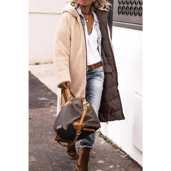 Women's green sherpa-lined insulated parka, featuring long sleeves and a cozy design suitable for urban winter fashion.