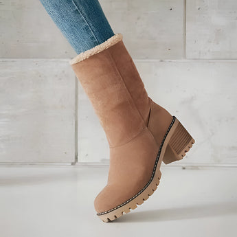 Women's khaki green suede shearling block heel ankle boots, featuring a stylish design with a comfortable block heel.