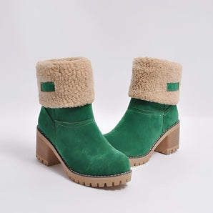 Women's green suede shearling block heel ankle boots with a stylish design and fur lining, showcasing a fashionable combination of suede and leather materials.