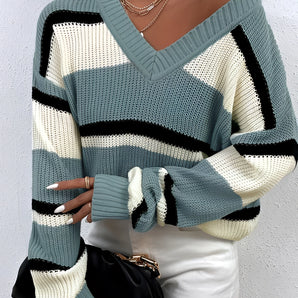 Women's green v-neck off-shoulder striped knit sweater displayed on a mannequin, showcasing details such as the shoulder, neck, and arm areas.