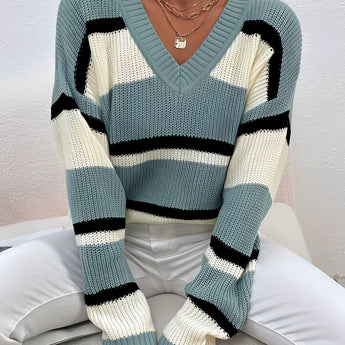 Women's green v-neck off-shoulder striped knit sweater, showcasing shoulder and neck design with a comfortable fit, suitable for casual outerwear.