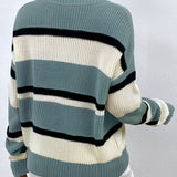Women's green V-neck off-shoulder striped knit sweater featuring long sleeves and a soft, textured fabric.