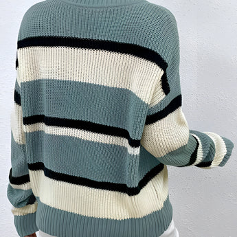 Women's green V-neck off-shoulder striped knit sweater featuring long sleeves and a soft, textured fabric.
