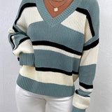 Women's blue off-shoulder knit sweater featuring a V-neck design with striped pattern, long sleeves, and a loose fit.