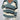 Women's blue off-shoulder knit sweater featuring a V-neck design with striped pattern, long sleeves, and a loose fit.