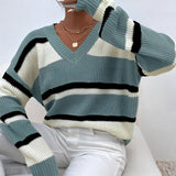 Women's green V-neck off-shoulder striped knit sweater with long sleeves and a relaxed fit.
