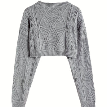 Women's grey cropped cable knit wool sweater featuring a stylish design with a high neck and long sleeves, showcasing winter fashion.