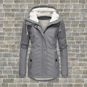 Women's grey hooded parka in size 4XL, featuring a waterproof and insulated design with a collar, long sleeves, and stylish overcoat fit.
