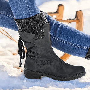 Women's grey leather waterproof insulated lace-up winter boots in Nero color, size 43, worn with denim jeans.