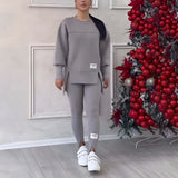 Women's Grey Loungewear Set in size 3XL, featuring a stylish and comfortable grey sweatshirt with long sleeves and matching pants, suitable for casual fashion and lounging.