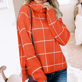 
A women's grey plaid fleece sweater featuring a cozy high neck pullover design, shown in an XL size with orange accents. The sweater has long sleeves and a comfortable fit, ideal for casual wear.