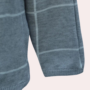 Women's grey plaid fleece sweater featuring a cozy high neck pullover design with long sleeves.