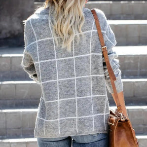 Women's grey plaid fleece sweater with a cozy high neck pullover design, featuring long sleeves and a tartan pattern.