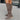 
Women's grey suede over-the-knee boots featuring a buckle detail, shown in a Marron color in size 43, displayed against a wooden floor background.