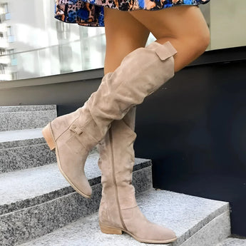 Women's grey suede over-the-knee boots featuring a decorative buckle detail, shown in a beige variant, size 43.