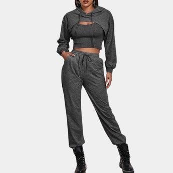 Women's dark gray tracksuit set in size XL, featuring a cropped hoodie and joggers, designed for an urban athleisure style.