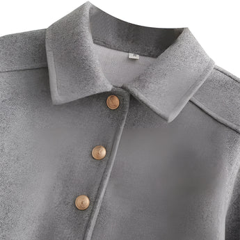 Women's grey wool blend cropped jacket featuring a button front, long sleeves, and a collar. The jacket has a blazer-style design, suitable for stylish winter outerwear and formal wear occasions.