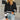 Women's half-zip color block sweater in green, black, and white, featuring a casual design suitable for fall fashion. The sweater is displayed in an XL size with a focus on shoulder, neck, and sleeve details.